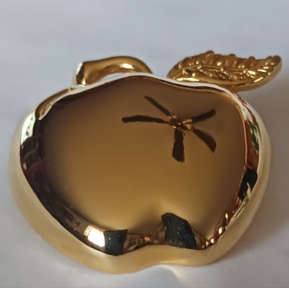 Shiny Paquette Gold tone pin/brooch